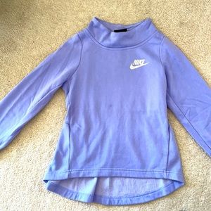 Cute girl Nike sweatshirt with peplum detailed in the bacj sz S. Like new